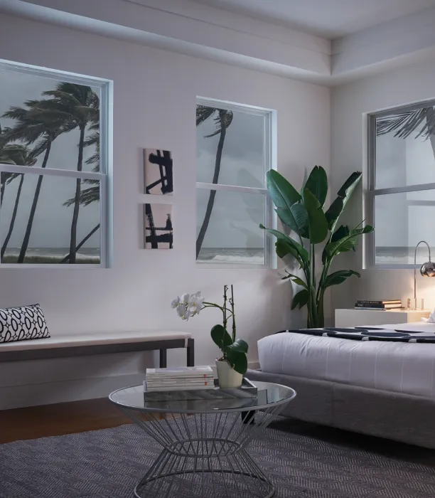 A photo from inside a bedroom while outside is a hurricane.