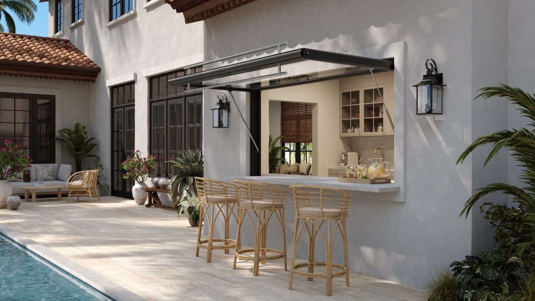 The WINDOOR Pass-Through Awning Window features concealed gas springs for easy operation.
